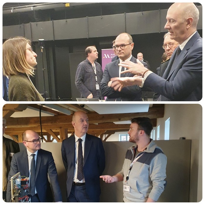 Deux dotorants LISPEN présentent leurs travaux de recherche au Ministre de l'indutrie.